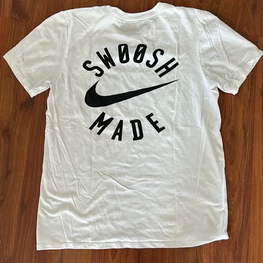 Nike swoosh made black and white T-shirt size S